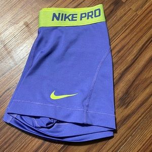 Purple & yellow Nike pros